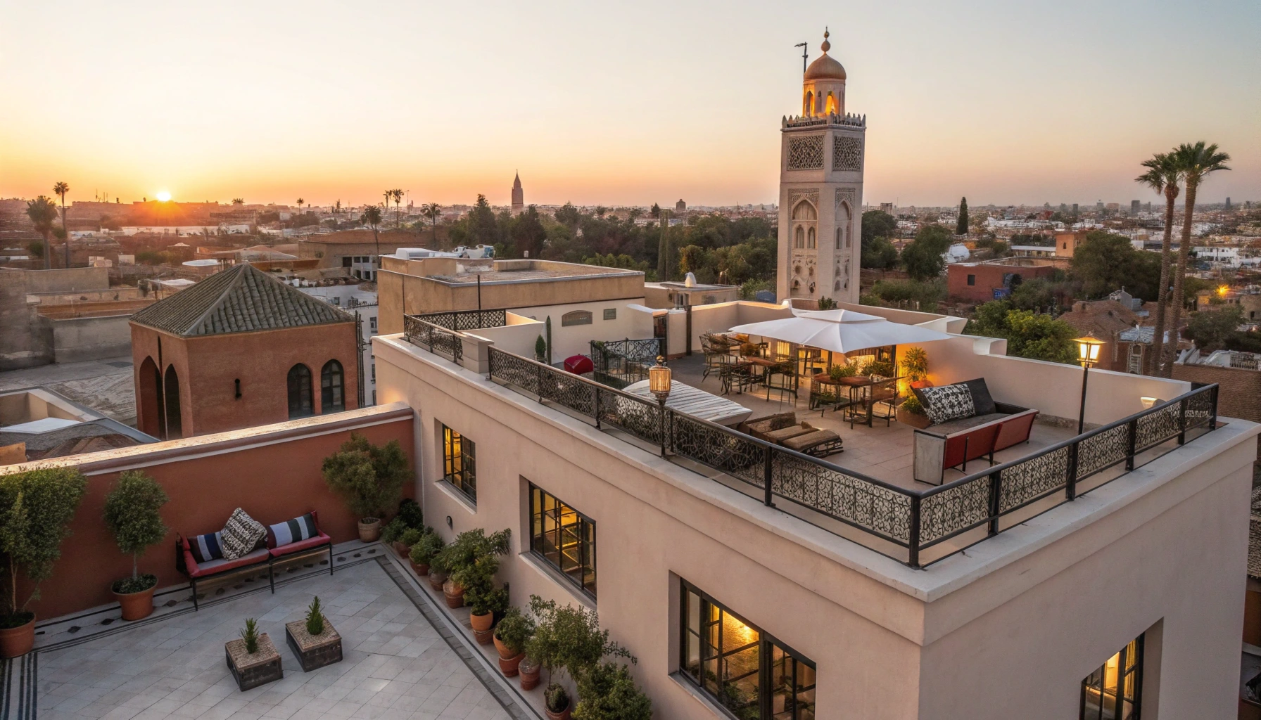 Vue aérienne d’un appartement Airbnb moderne à Marrakech avec terrasse et ville en arrière-plan